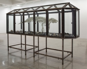 Mark DION Trichechus manatus latirostris 2013 plastic skeleton, tar, found objects in steel and glass case 72 x 40 x 176 inches 